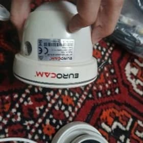 камера