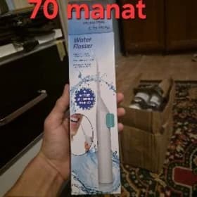Kiçi irrigator diş arassalaý