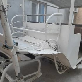 at.