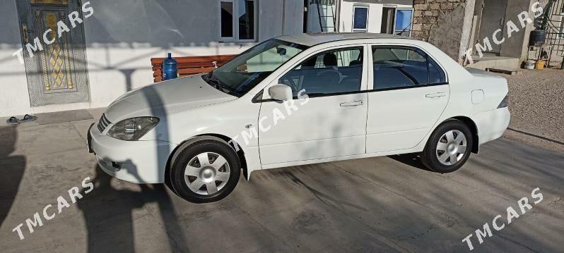 Mitsubishi Lancer 2011 - 90 000 TMT - Балканабат - img 2