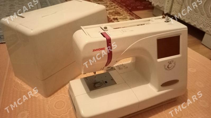 Janome E350 - Кëши - img 2