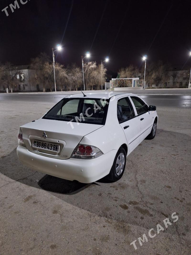 Mitsubishi Lancer 2011 - 79 000 TMT - Балканабат - img 2