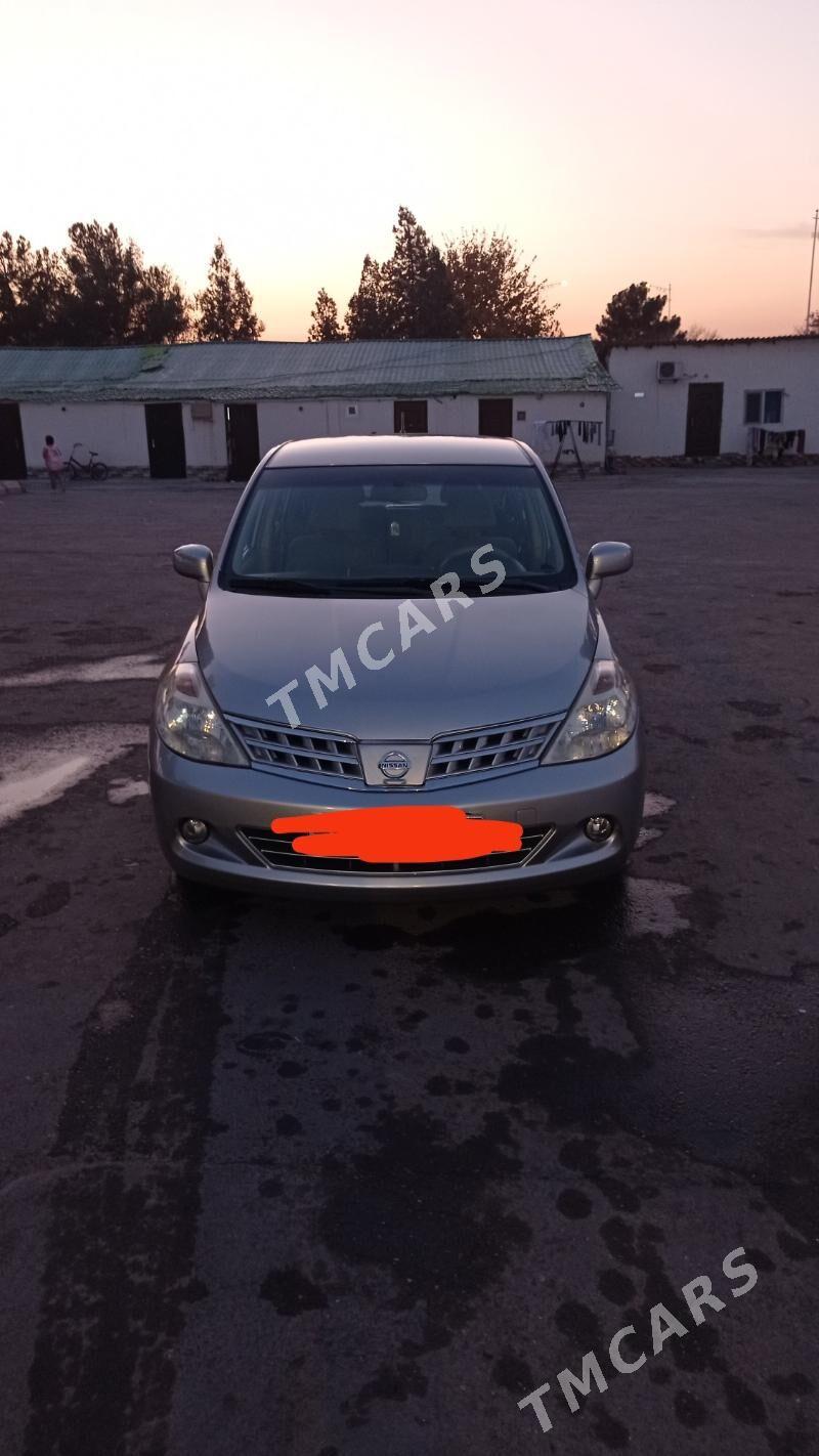 Nissan Tiida 2006 - 120 000 TMT - Кëши - img 2