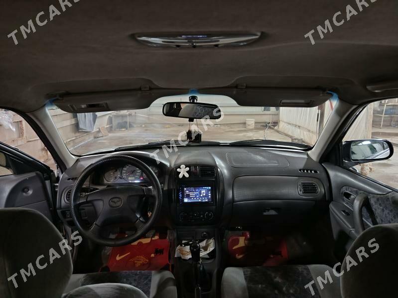 Mazda Familia 1999 - 50 000 TMT - Дашогуз - img 8