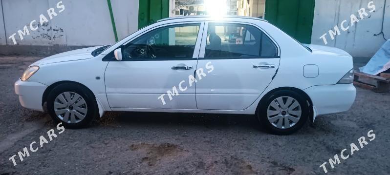 Mitsubishi Lancer 2006 - 94 000 TMT - Bedew - img 4