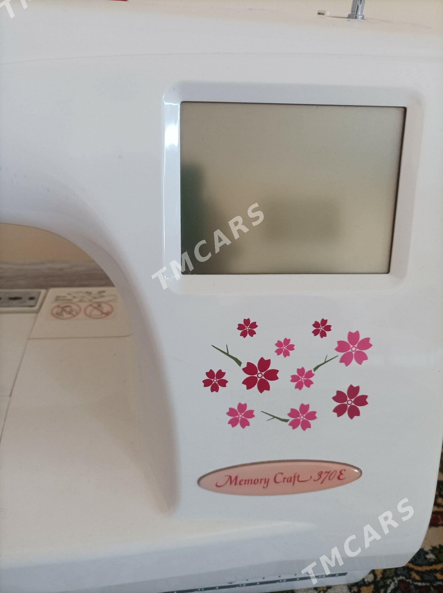 Janome 370E - Büzmeýin - img 1