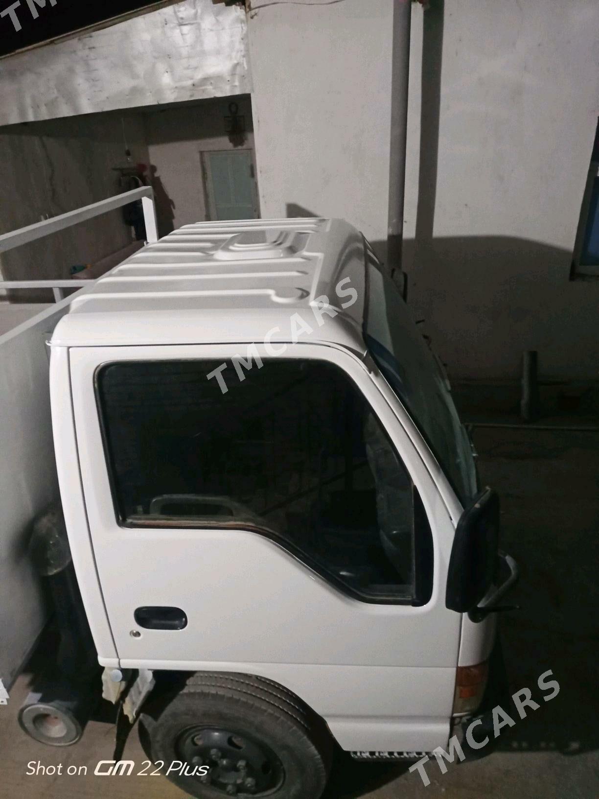 Isuzu Elf 2000 - 240 000 TMT - Койтендаг - img 4