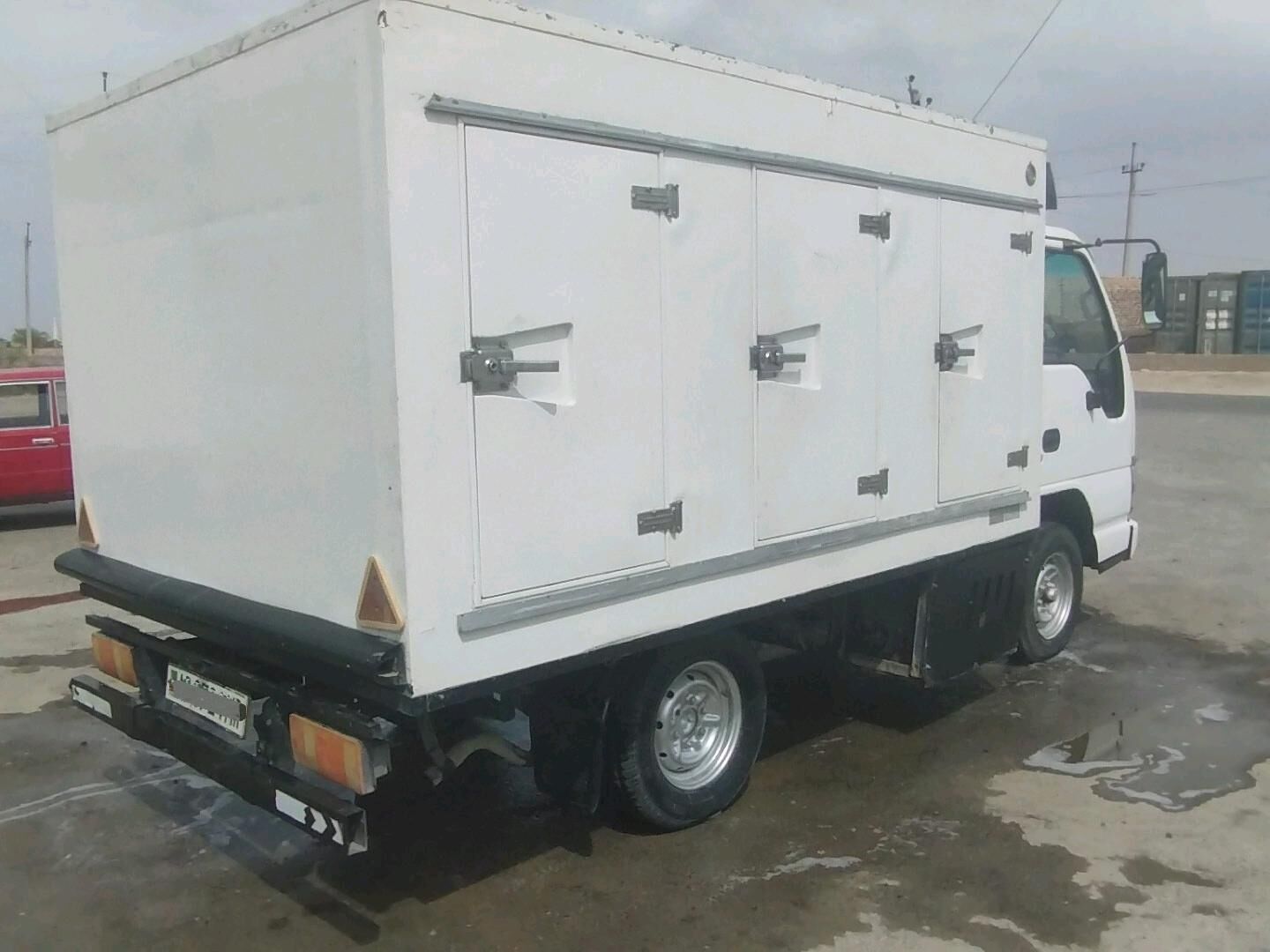 Isuzu Elf 2009 - 200 000 TMT - Мары - img 6