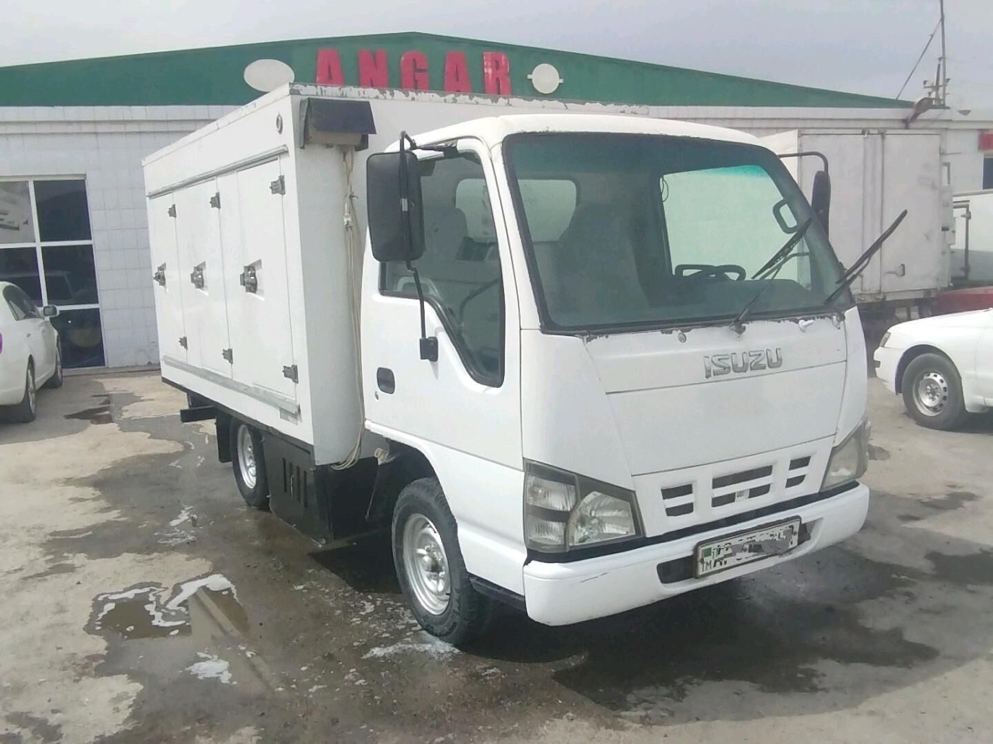 Isuzu Elf 2009 - 200 000 TMT - Мары - img 7