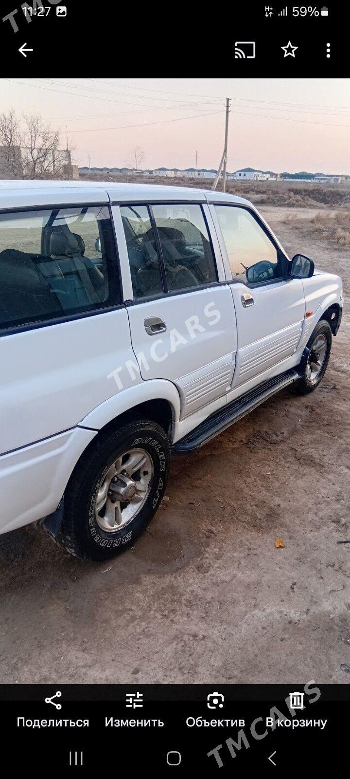 SsangYong Musso 2001 - 20 000 TMT - Дашогуз - img 7
