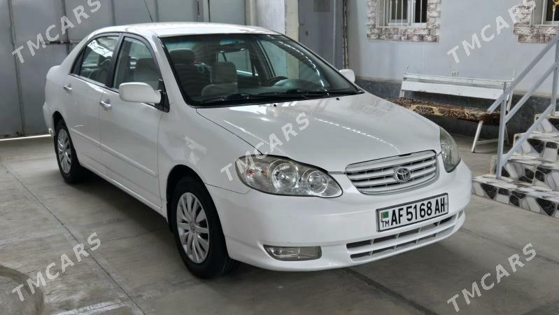 Toyota Corolla 2003 - 123 000 TMT - Теджен - img 1