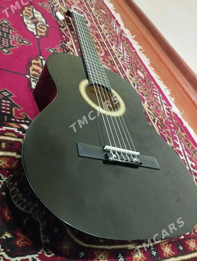 gitara M.B.A.T - Болдумсаз - img 1