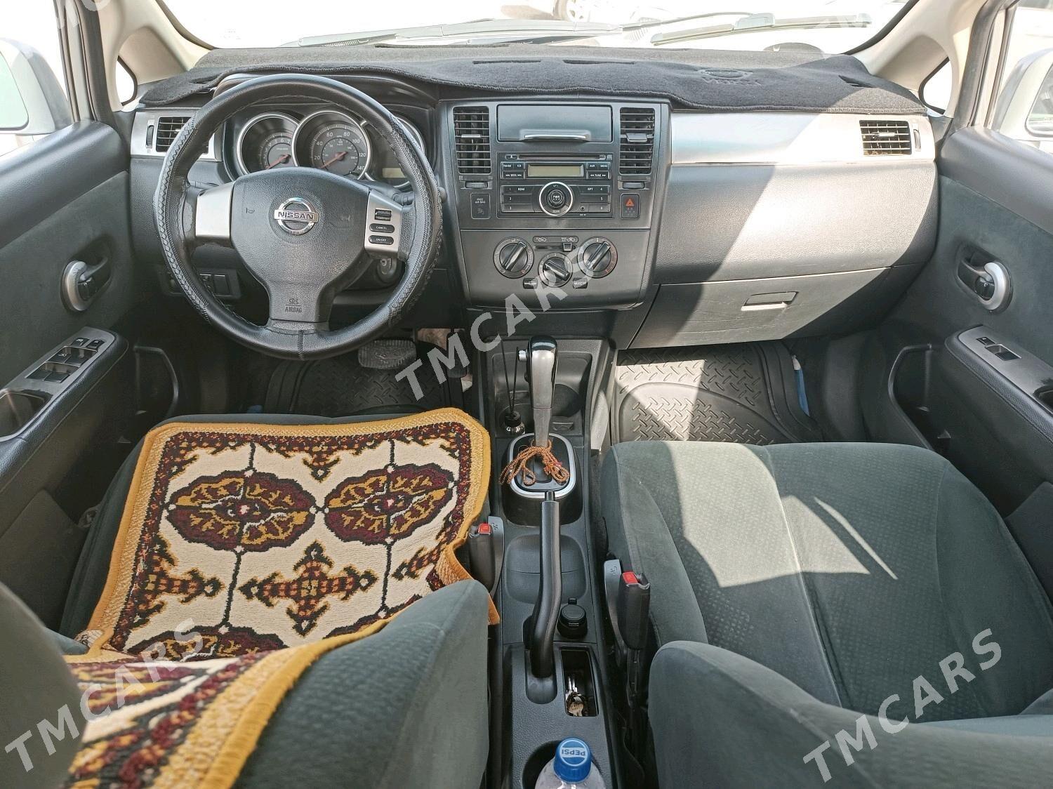 Nissan Versa 2009 - 100 000 TMT - Mary - img 7
