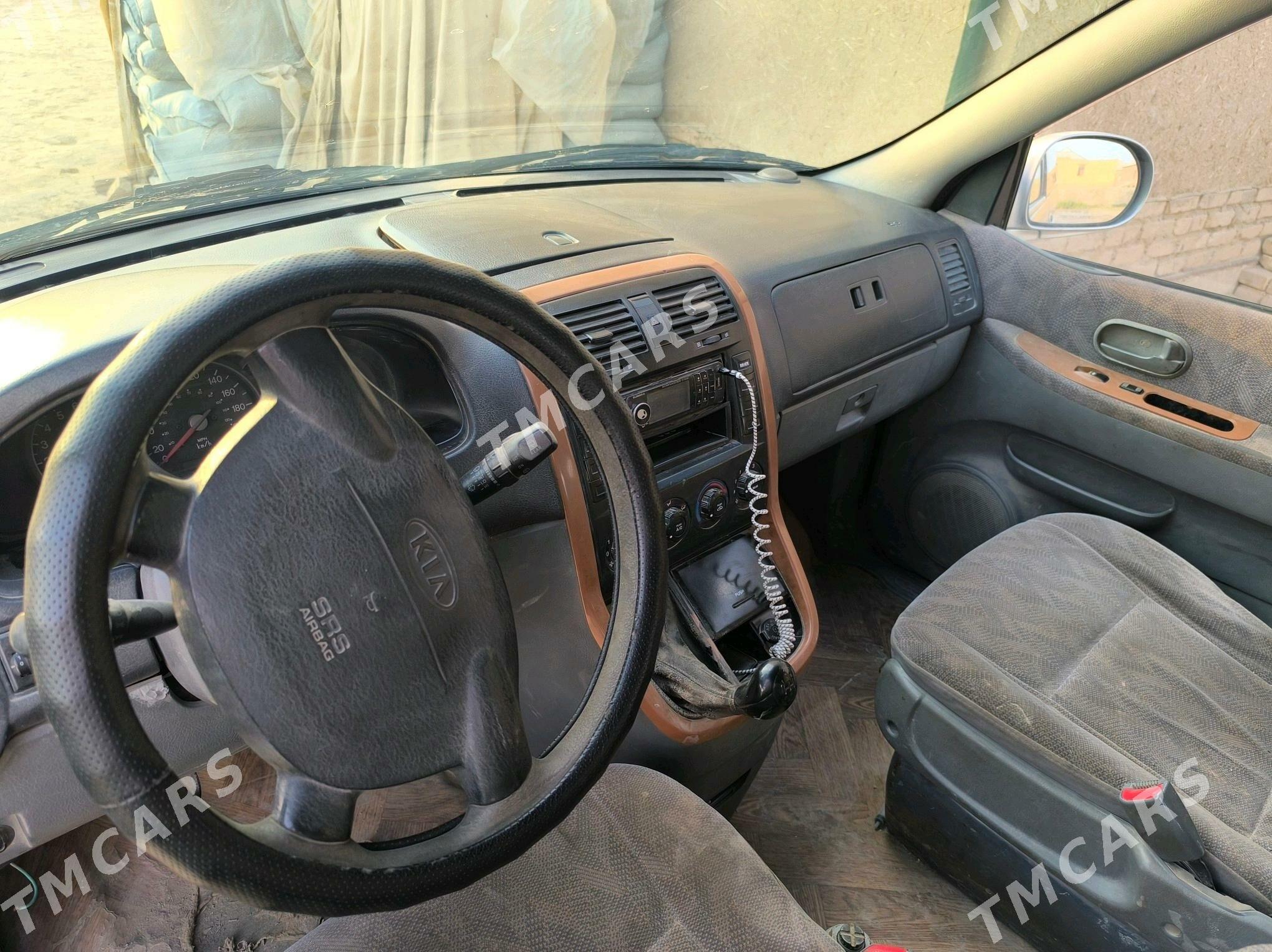 Kia Carnival 2003 - 40 000 TMT - Гурбансолтан Едже - img 6