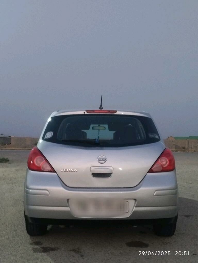 Nissan Versa 2011 - 130 000 TMT - Кака - img 5