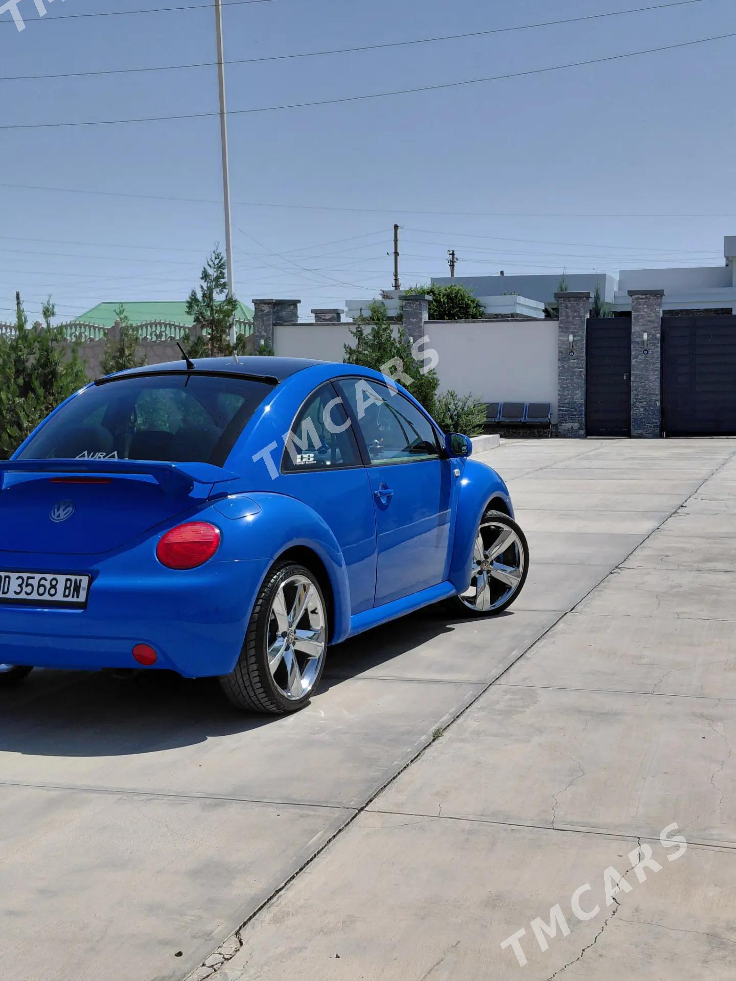 Volkswagen New Beetle 2003 - 55 000 TMT - Kaka - img 4