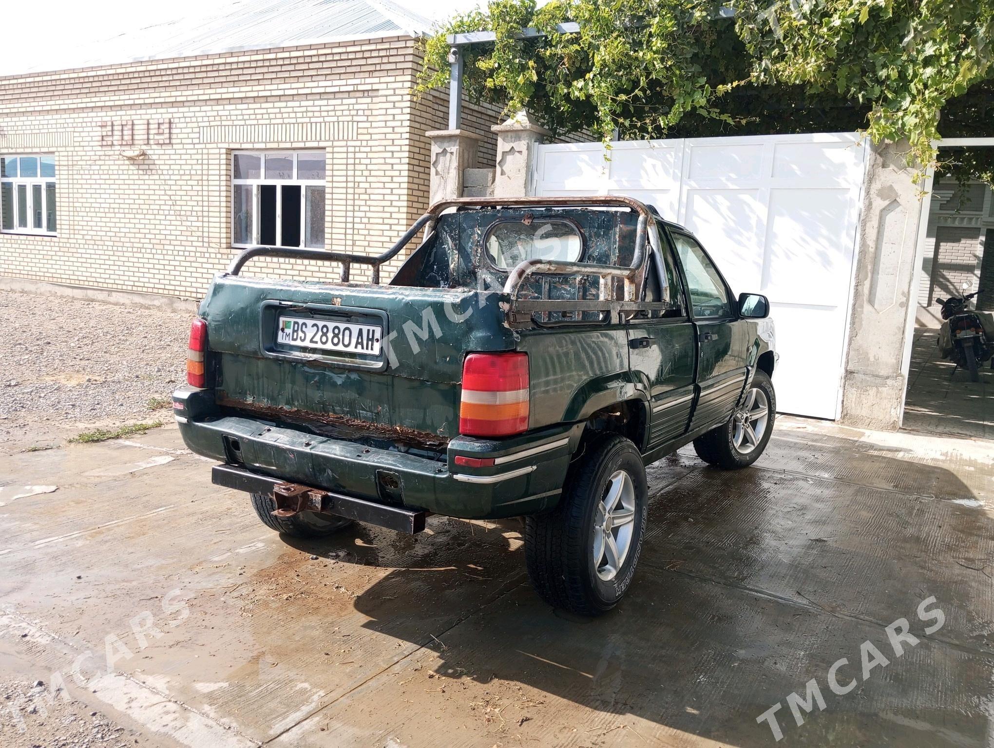 Jeep Grand Cherokee 2010 - 22 000 TMT - Bäherden - img 2