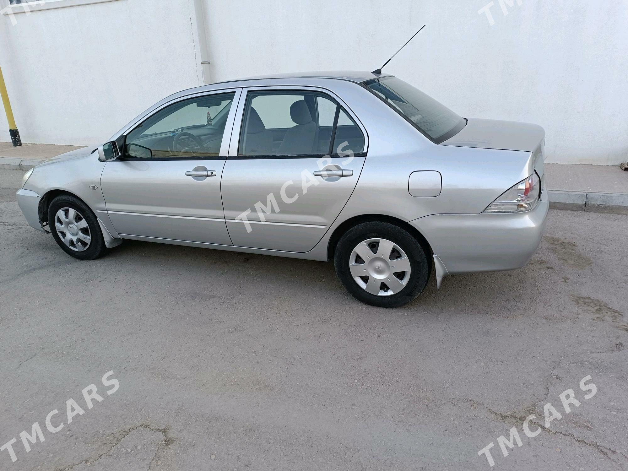Mitsubishi Lancer 2009 - 89 000 TMT - Балканабат - img 3