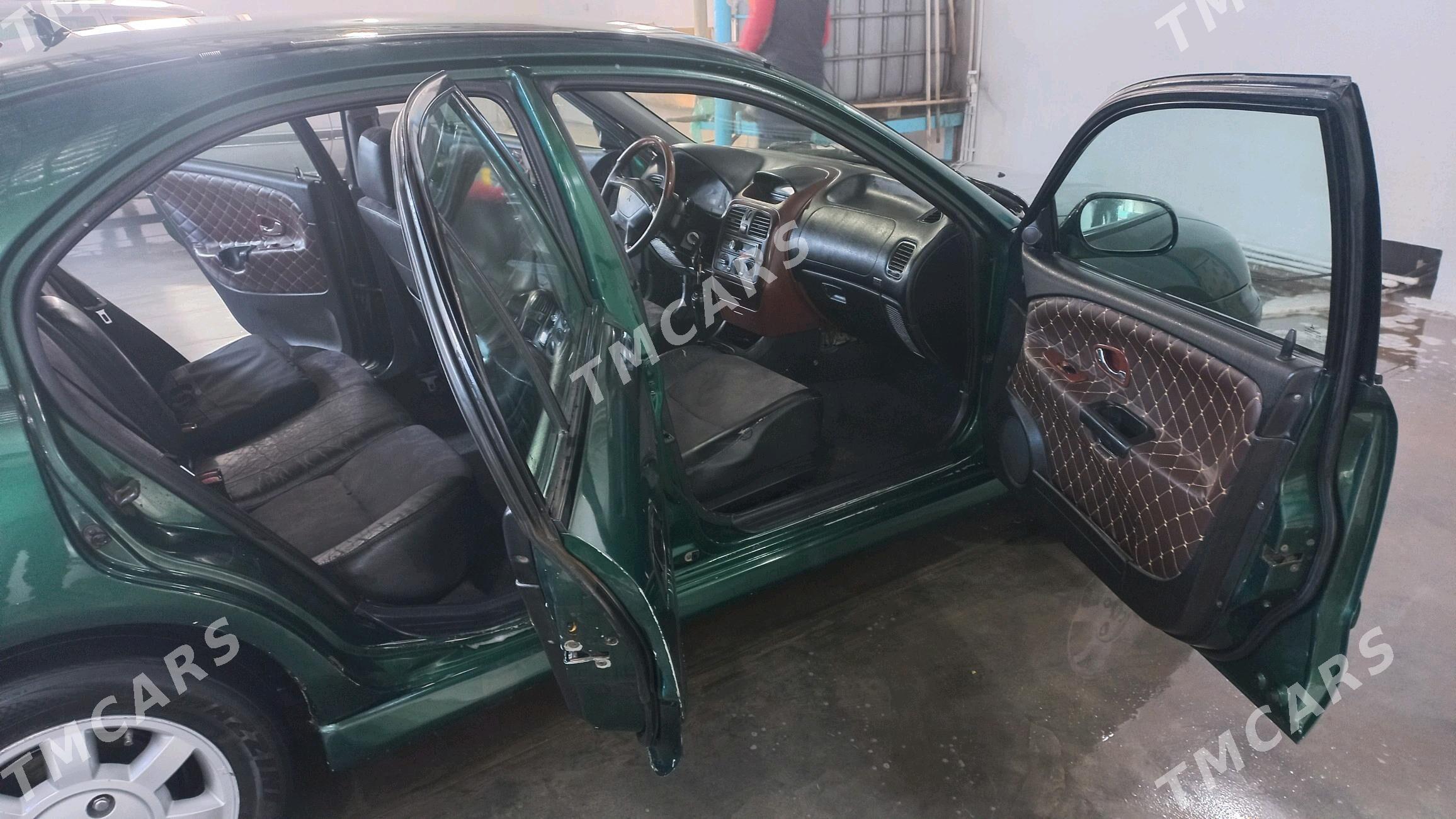 Mitsubishi Carisma 1999 - 60 000 TMT - Шабатский этрап - img 6