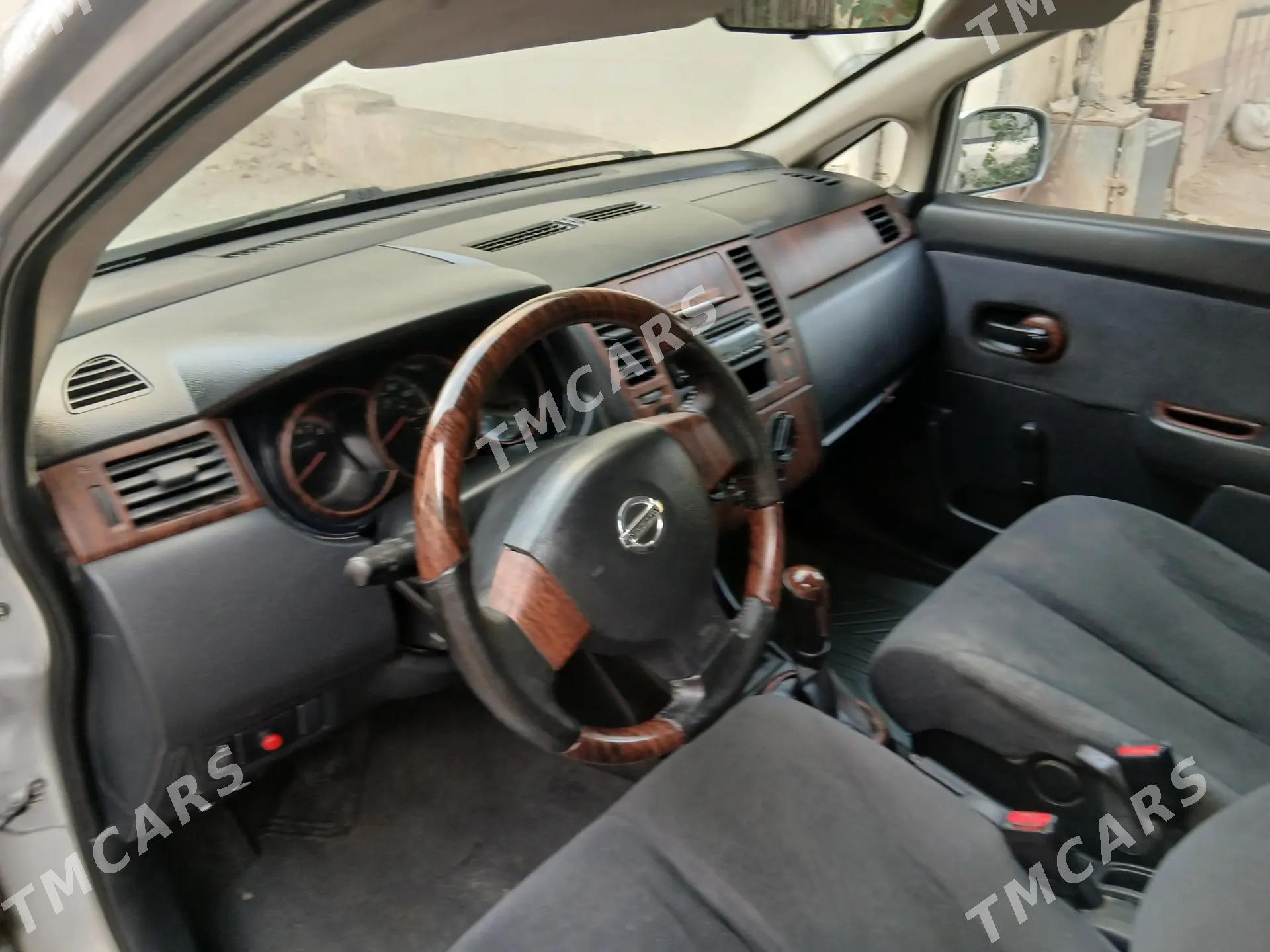 Nissan Versa 2010 - 100 000 TMT - Mary - img 7