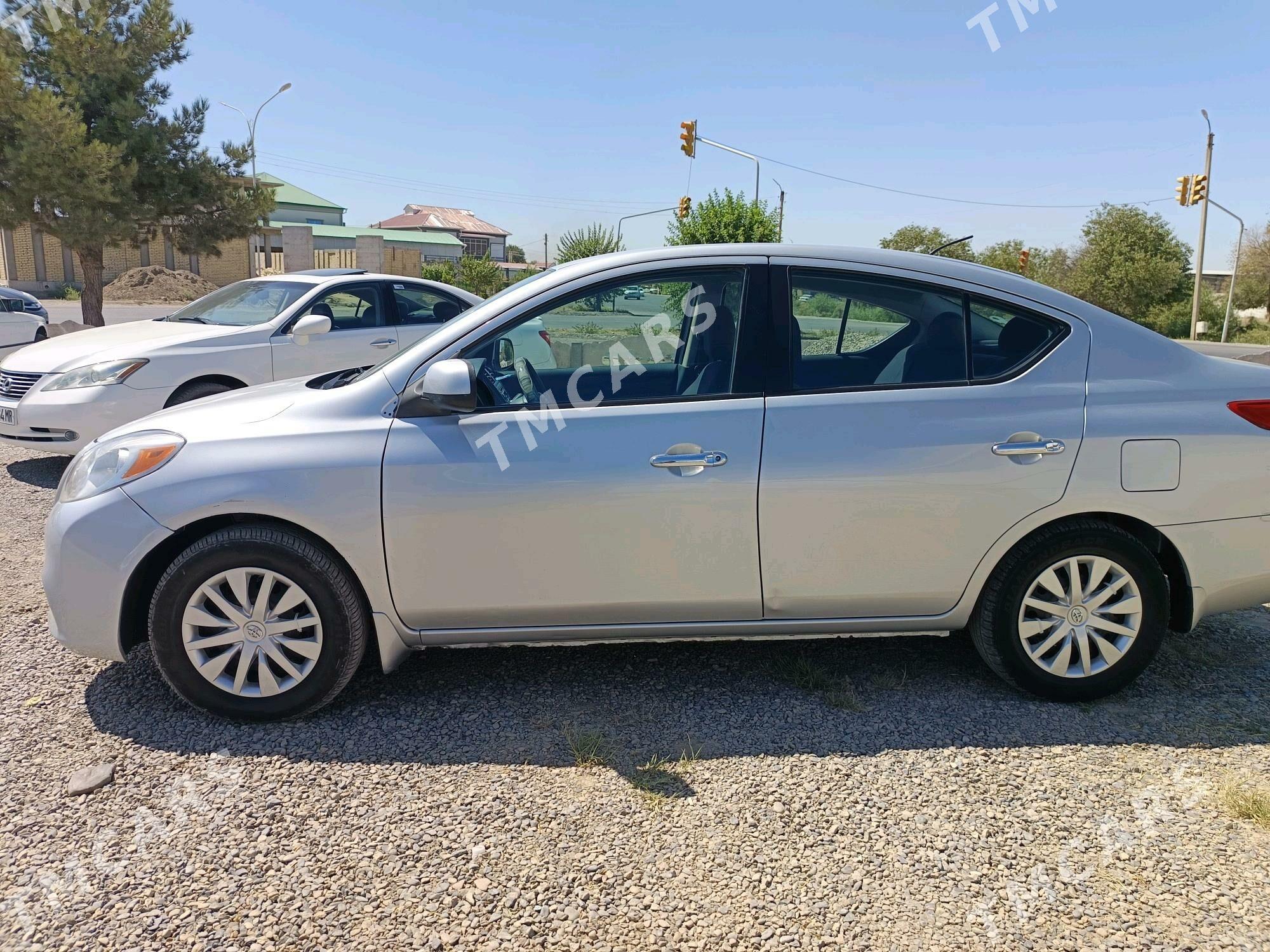 Nissan Versa 2012 - 100 000 TMT - Mary - img 5