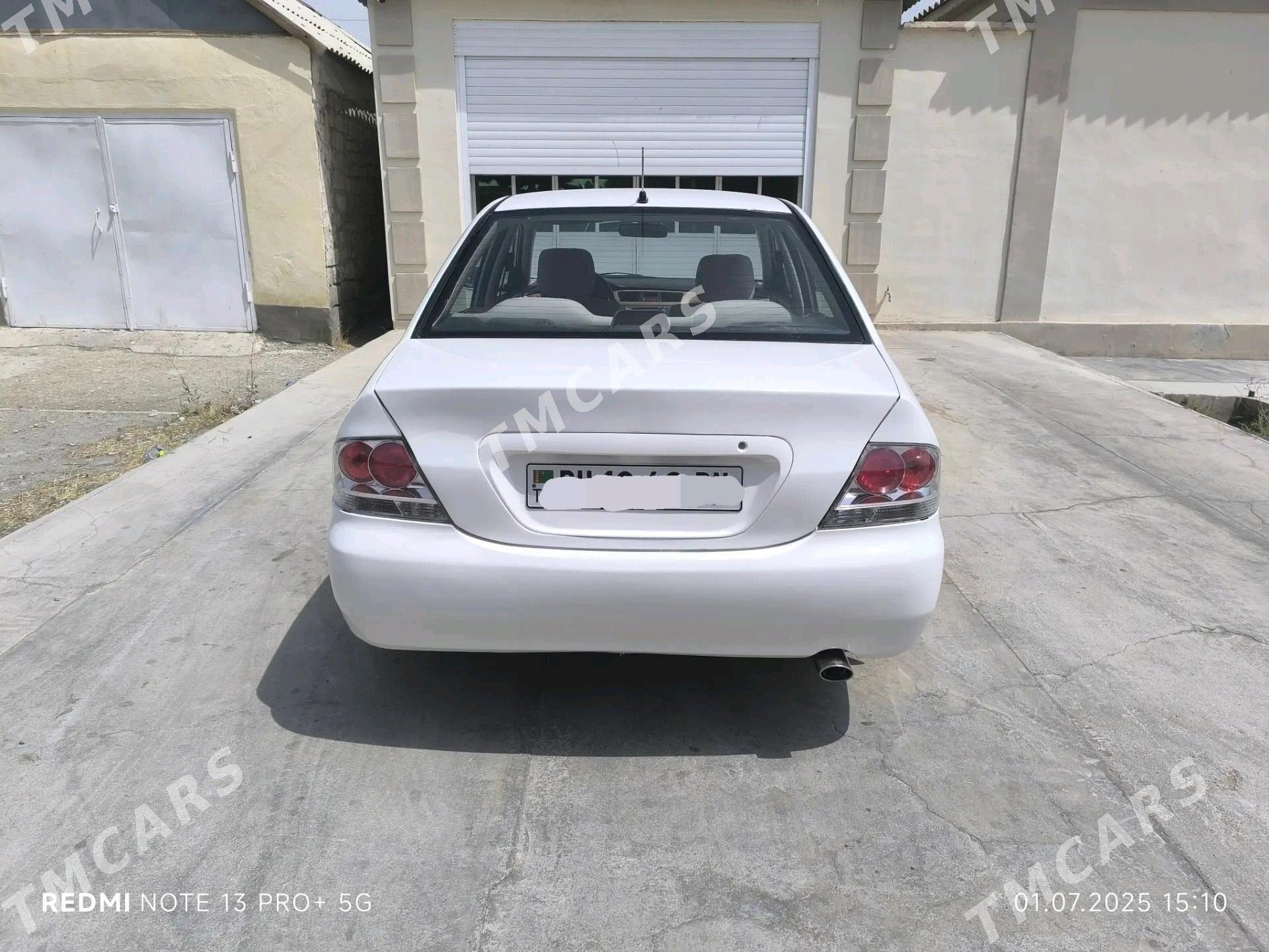 Mitsubishi Lancer 2010 - 105 000 TMT - Балканабат - img 4