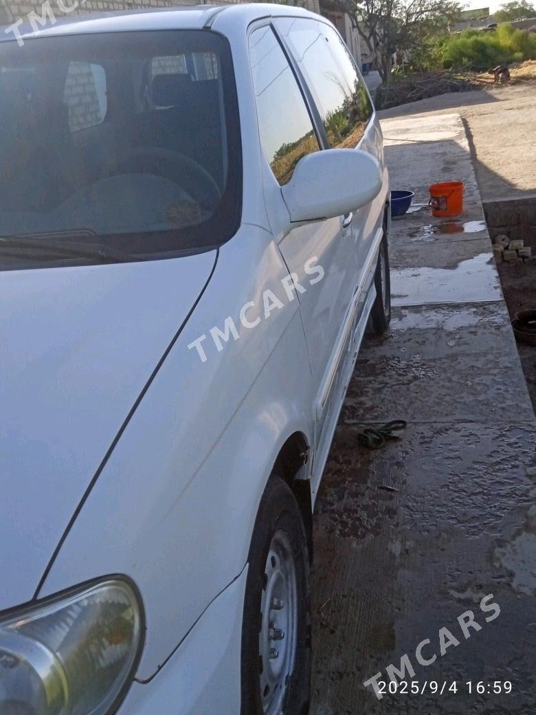 Kia Carnival 2001 - 40 000 TMT - Гурбансолтан Едже - img 6