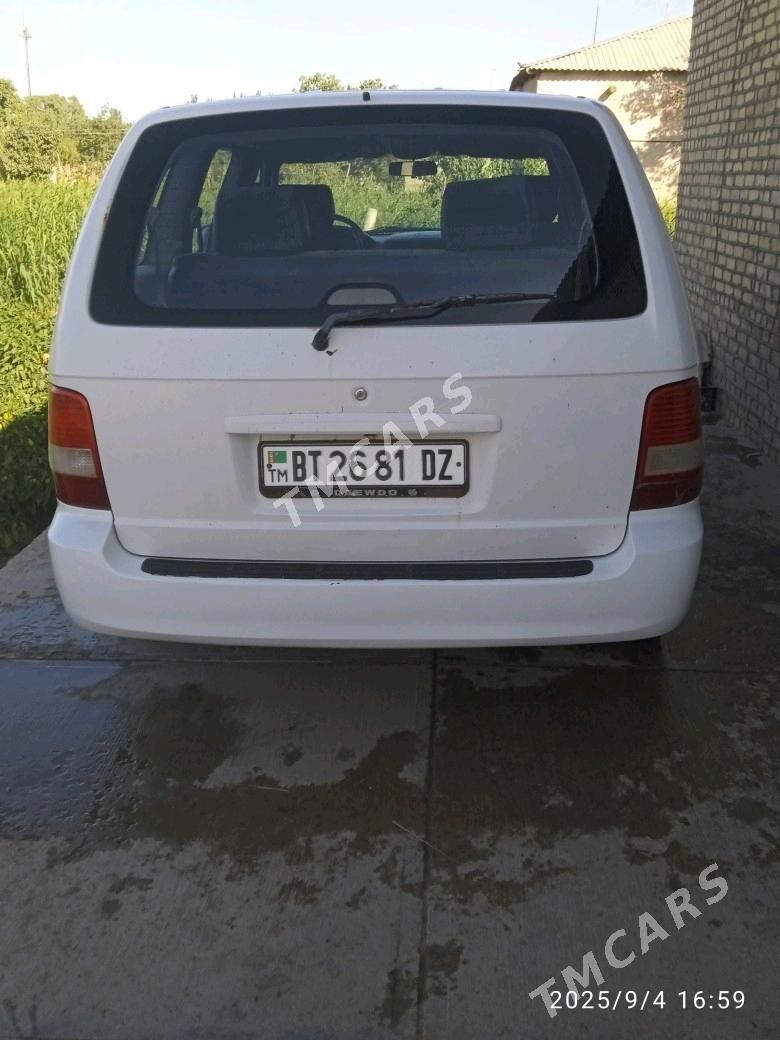 Kia Carnival 2001 - 40 000 TMT - Гурбансолтан Едже - img 5