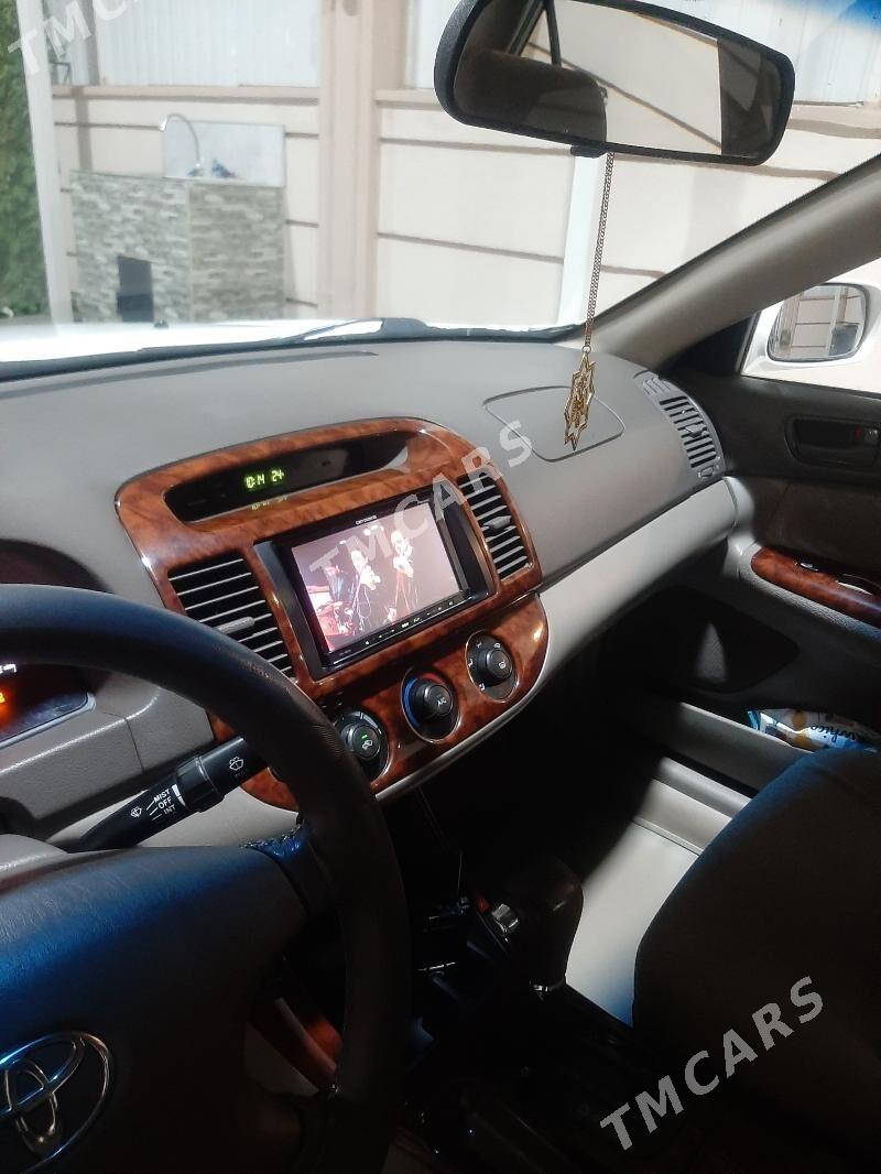Toyota Camry 2004 - 199 000 TMT - Мир 2 - img 5