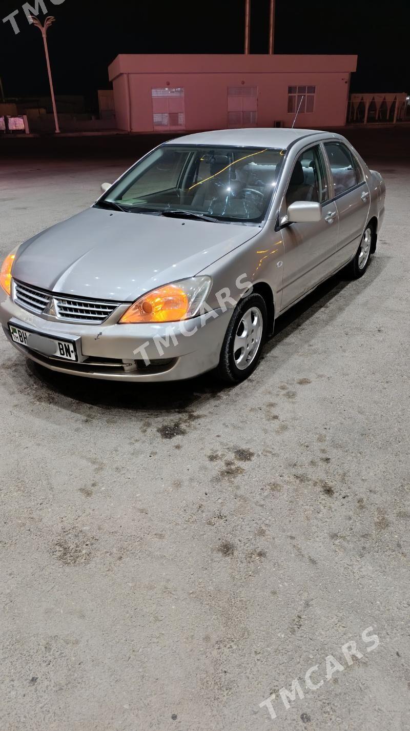 Mitsubishi Lancer 2010 - 96 000 TMT - Балканабат - img 2