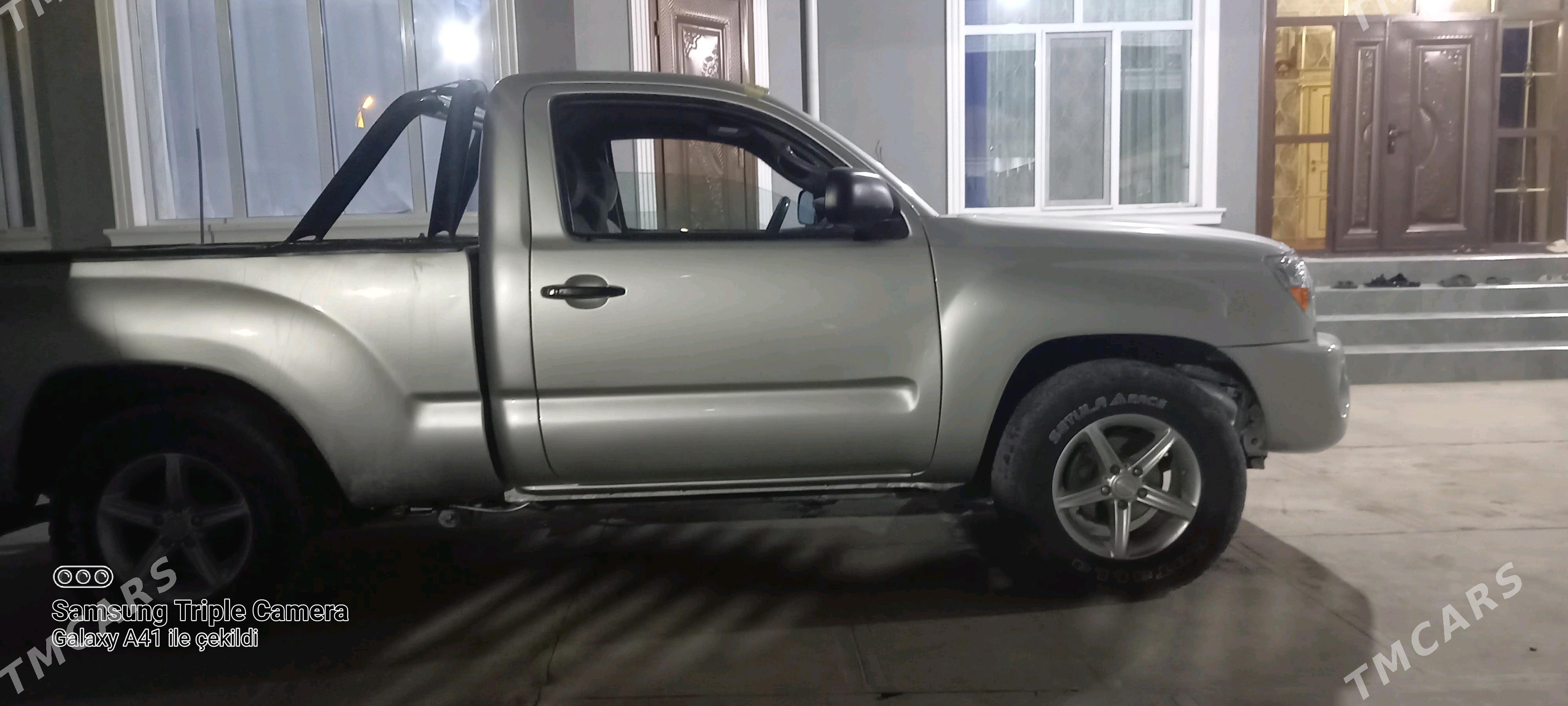 Toyota Tacoma 2011 - 115 000 TMT - Мары - img 4