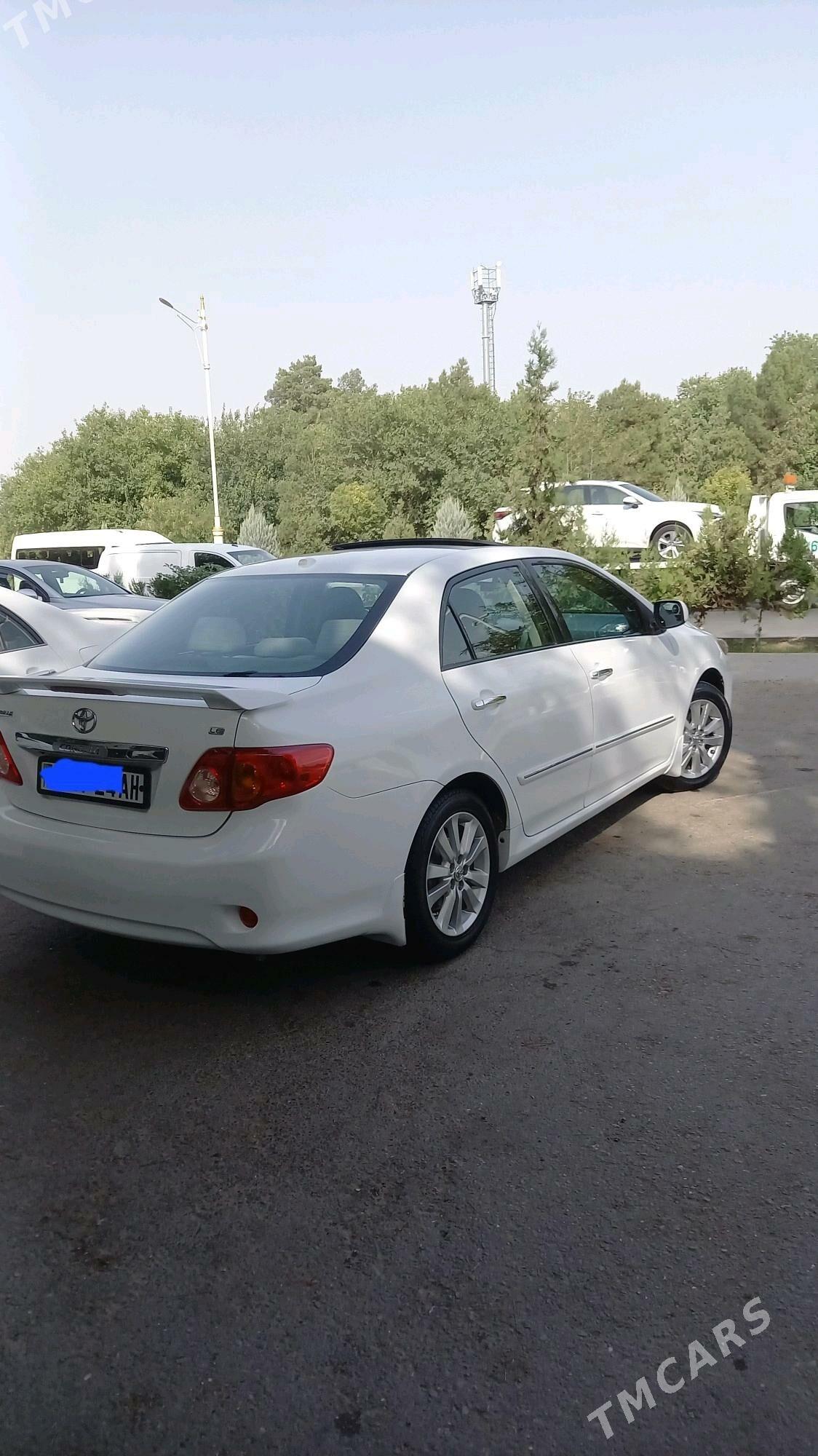 Toyota Corolla 2010 - 150 000 TMT - Айтакова (ул. Огузхана) - img 5