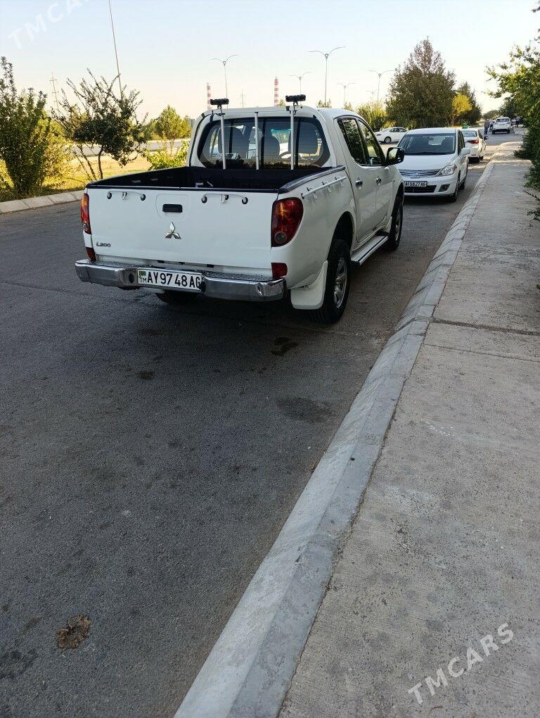 Mitsubishi L200 2011 - 195 000 TMT - 10 мкр - img 7