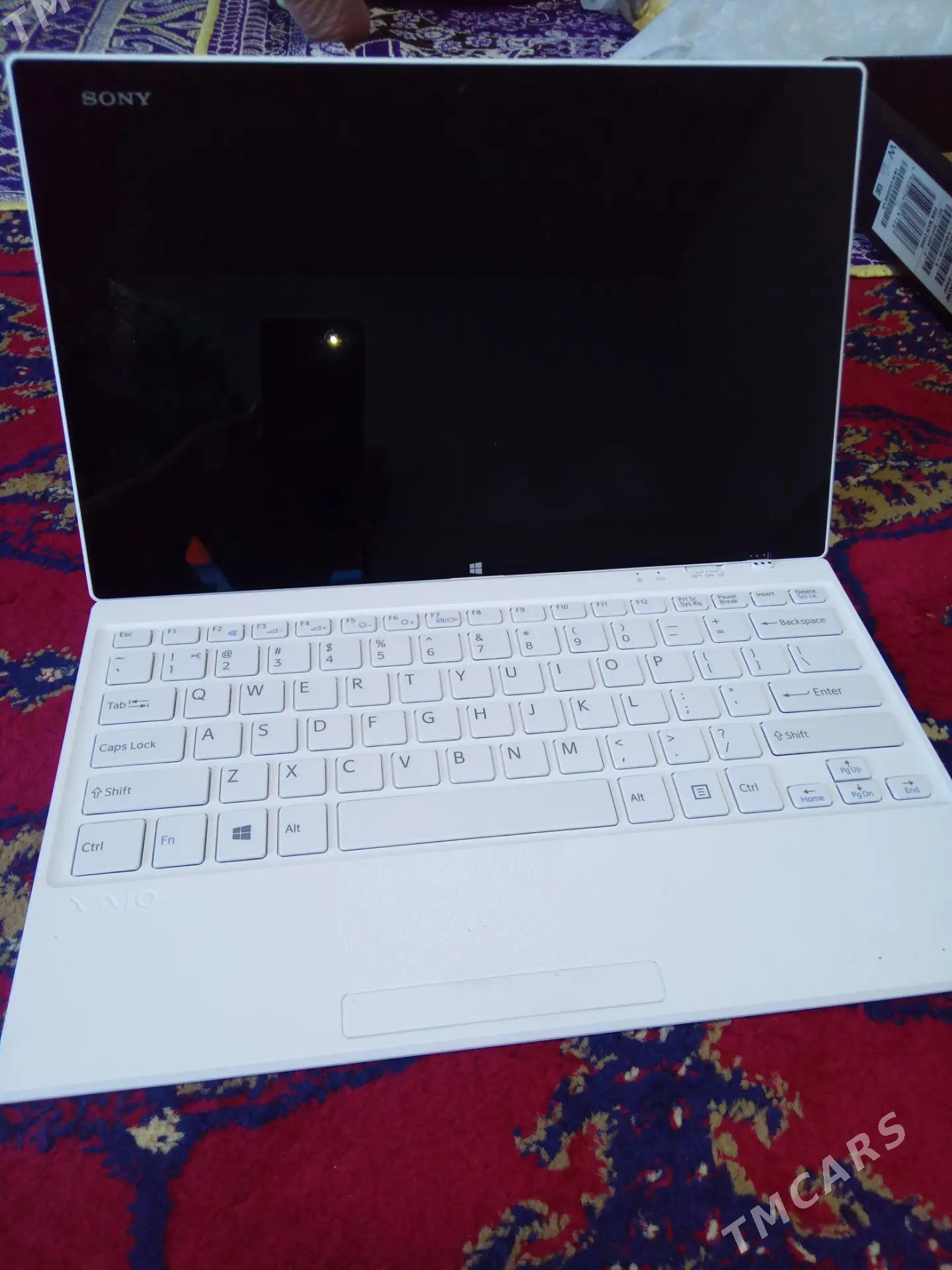 Laptop tap 11 - Бузмеин - img 1