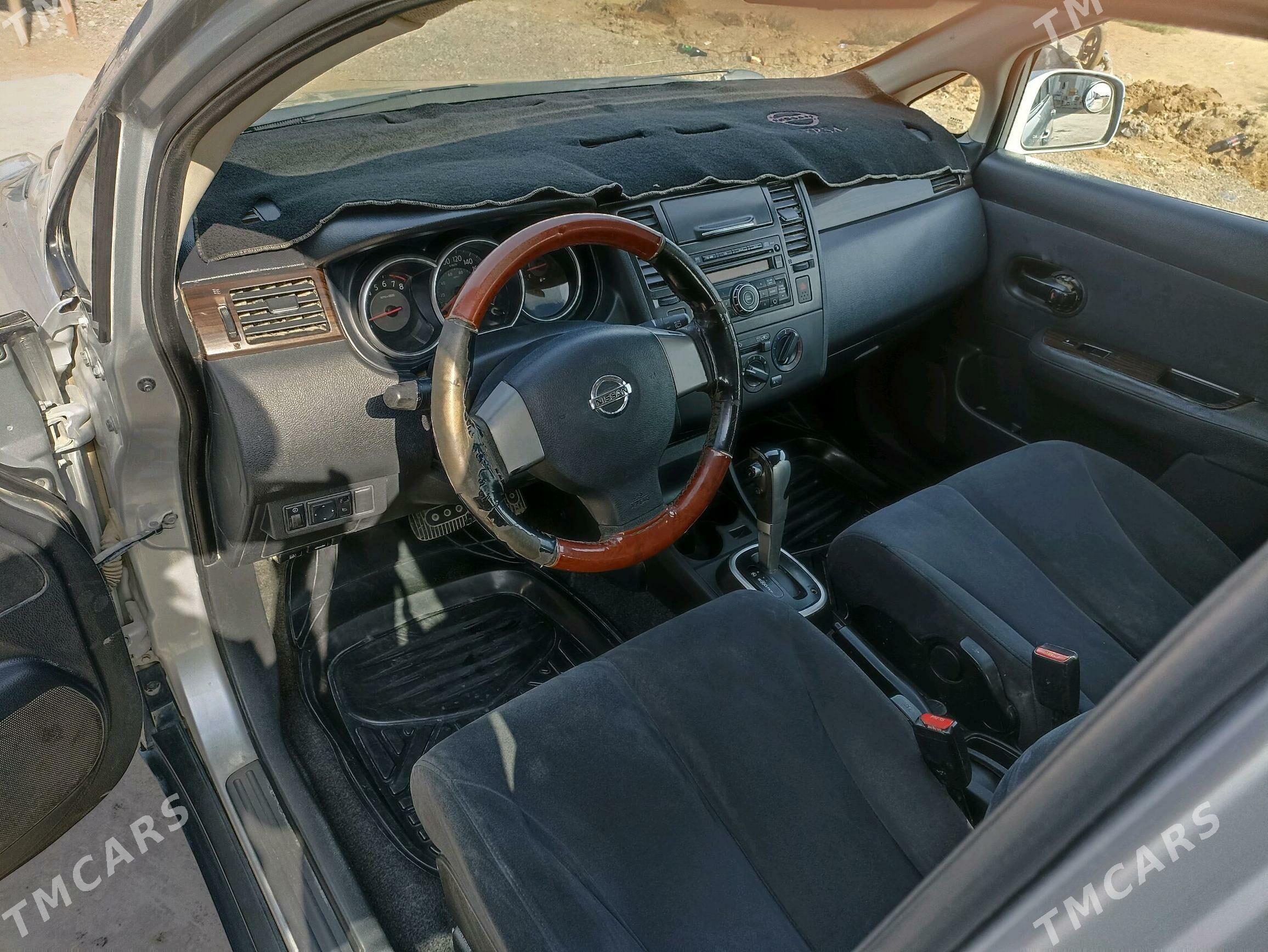 Nissan Versa 2009 - 110 000 TMT - Анев - img 1