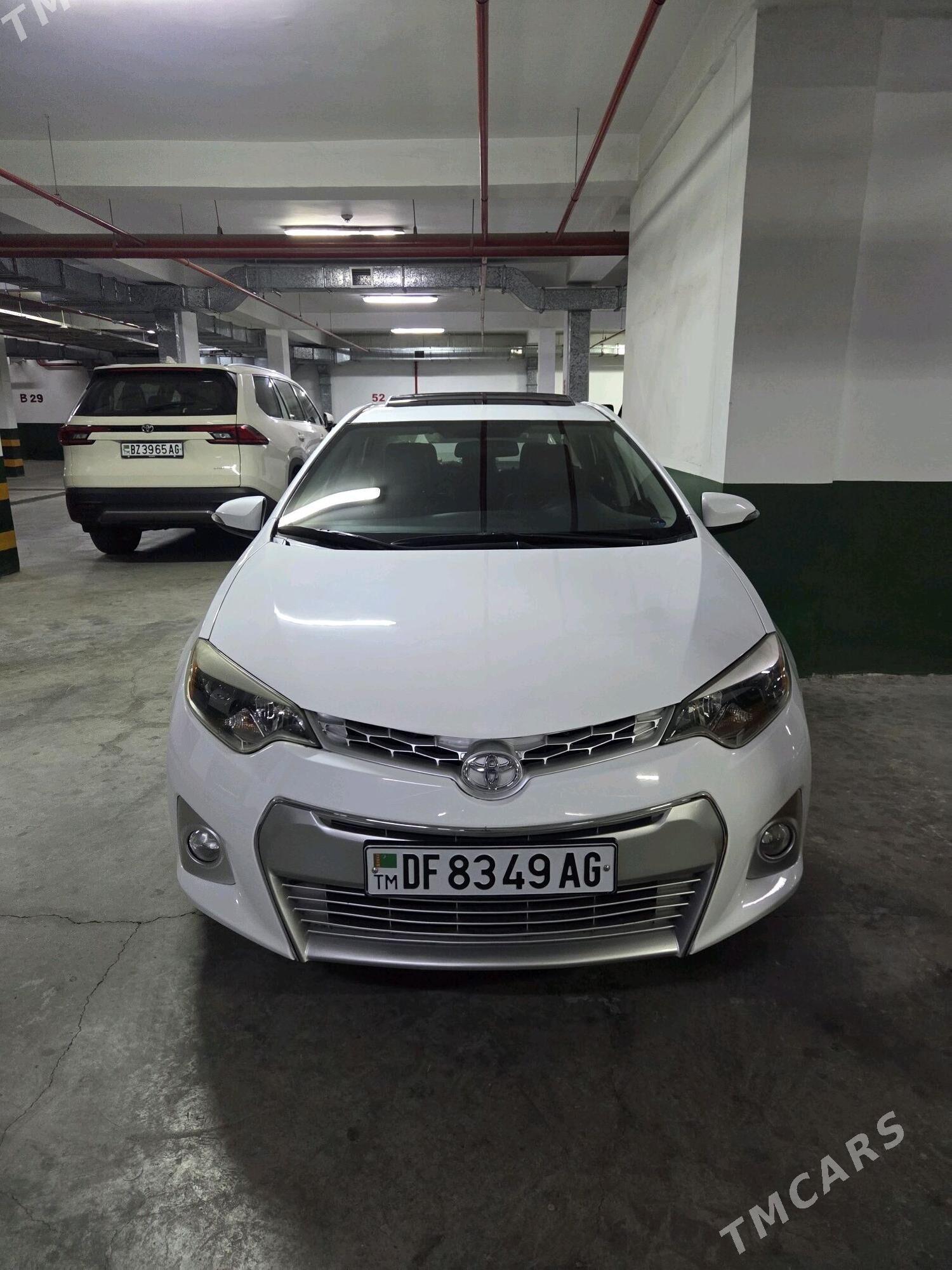 Toyota Corolla 2014 - 200 000 TMT - Айтакова (ул. Огузхана) - img 1