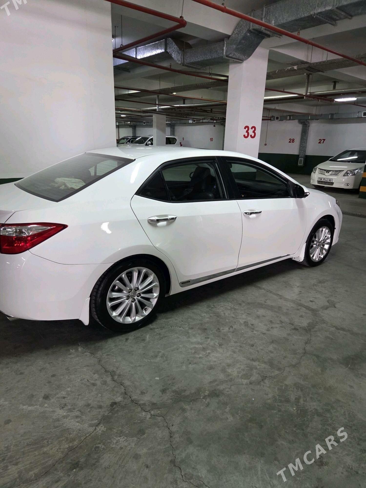 Toyota Corolla 2014 - 200 000 TMT - Айтакова (ул. Огузхана) - img 3