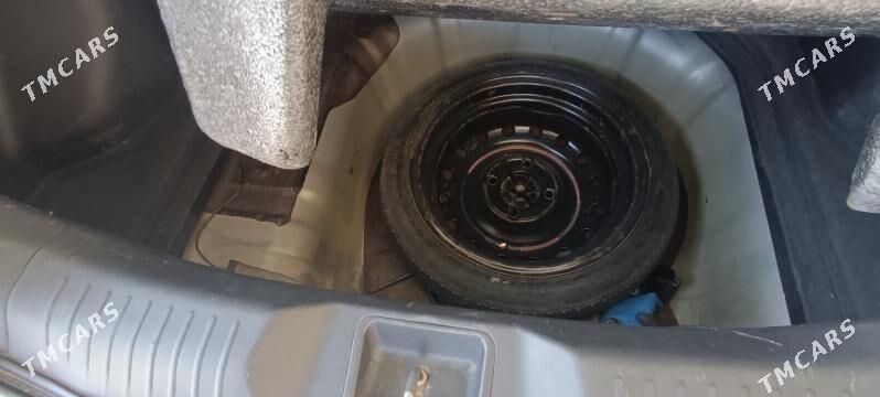 Nissan Versa 2010 - 138 000 TMT - Ашхабад - img 7