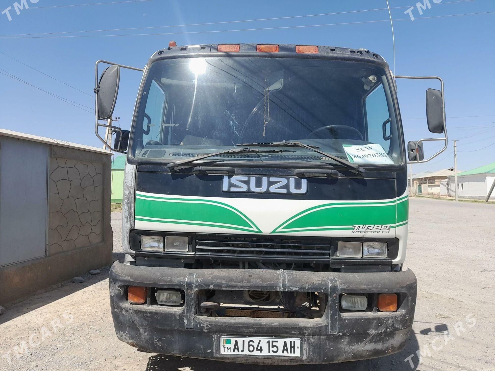 Isuzu Elf 2001 - 240 000 TMT - Кака - img 1