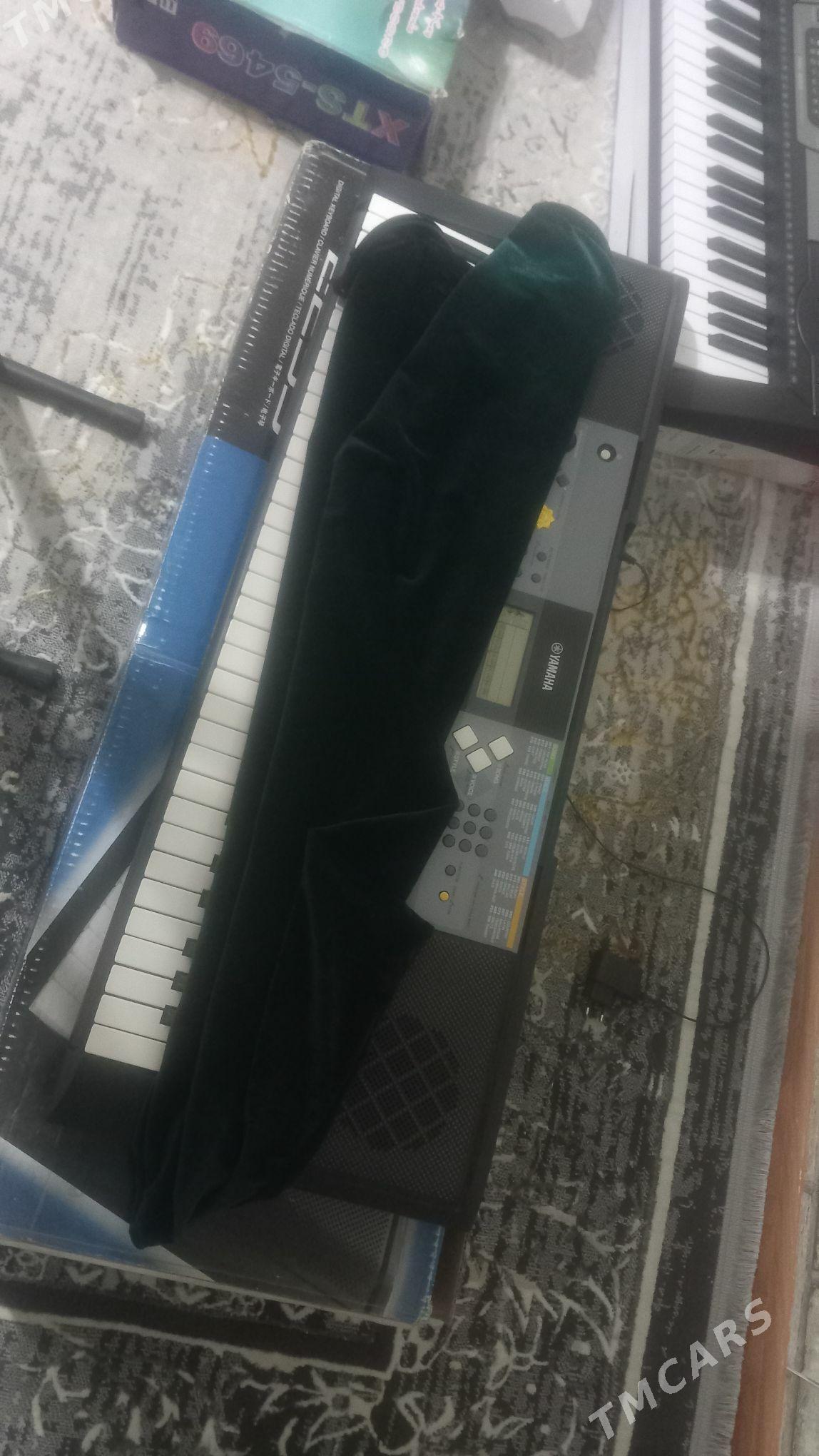 YAMAHA PSR E233 - Теджен - img 2