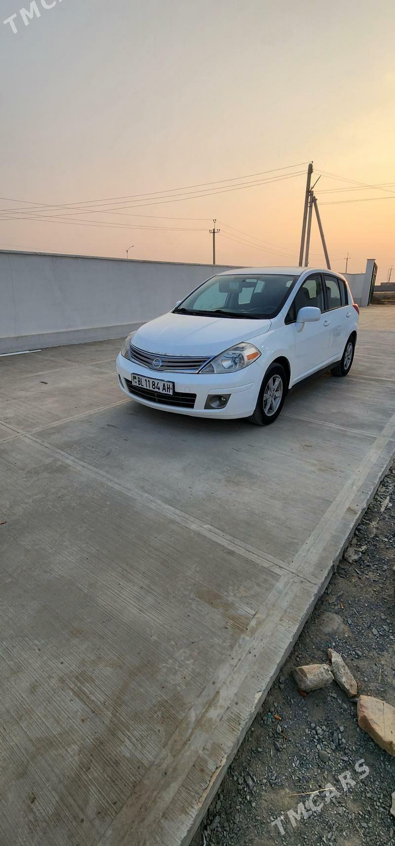 Nissan Versa 2013 - 117 000 TMT - Бахарден - img 1