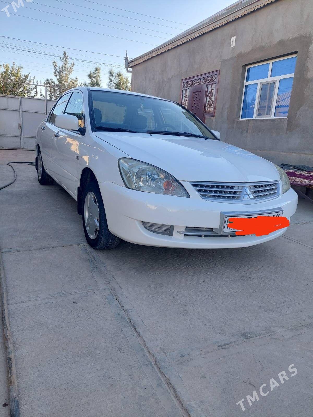 Mitsubishi Lancer 2011 - 93 000 TMT - Теджен - img 2