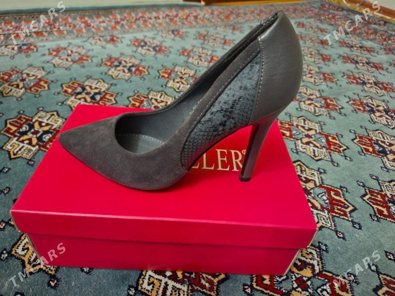 köwüş (şpilka) - Kim raýon - img 1