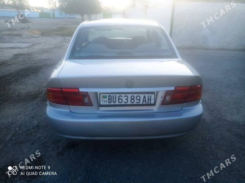 Kia Optima 2001 - 52 000 TMT - Arzuw - img 1