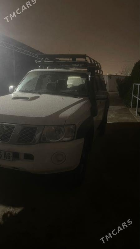 Nissan Patrol 2012 - 450 000 TMT - Ашхабад - img 1