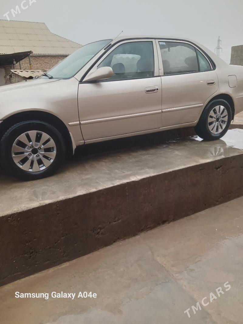 Toyota Corolla 2001 - 88 000 TMT - Теджен - img 1