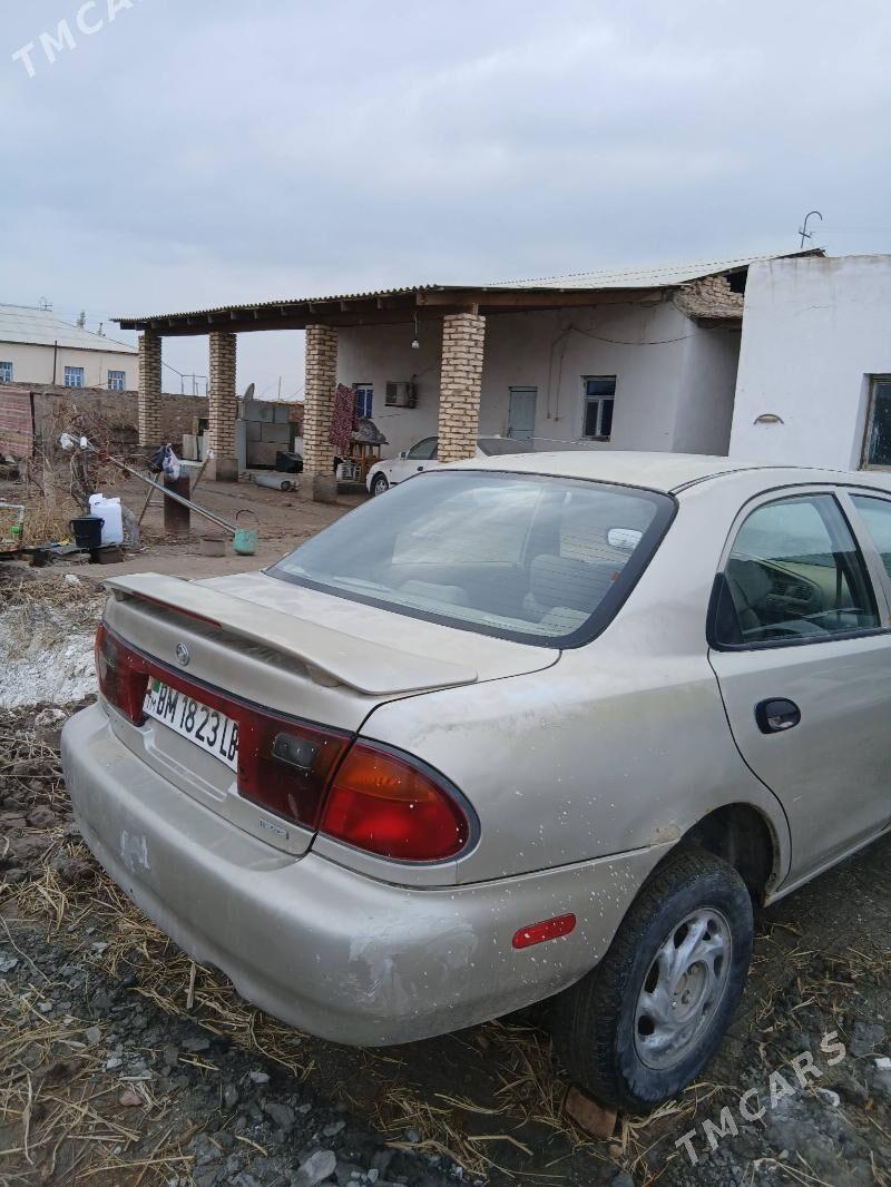 Mazda 626 1996 - 10 000 TMT - Койтендаг - img 1