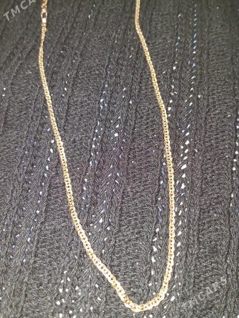 Gyzyl zynjyr - Кëши - img 1