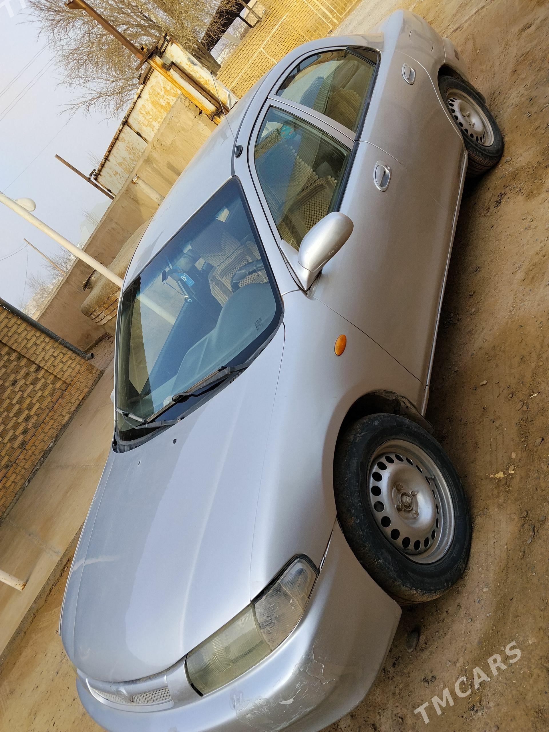 Mazda Mazda3 1998 - 25 000 TMT - Мары - img 1