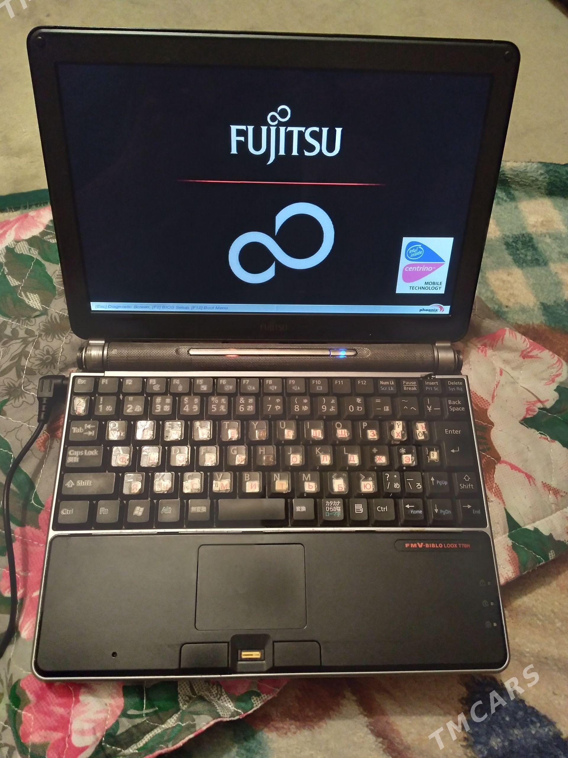 Fujitsu - Ким район - img 1